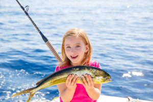 mahi fishing dorado taste does girl deep sea fish advantages blond kid newport beach catch happy cruise cooknovel vimbly