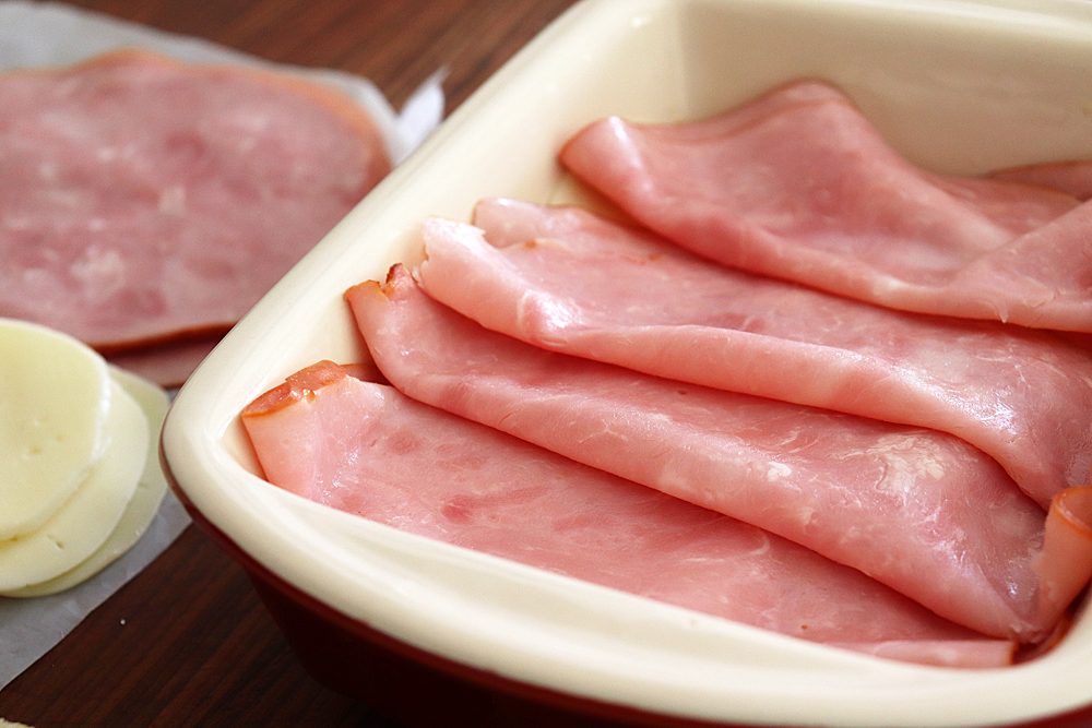 Layering slices of baked ham