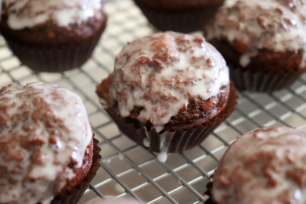 Close up of Glazed Chocolate Doughnut Muffins