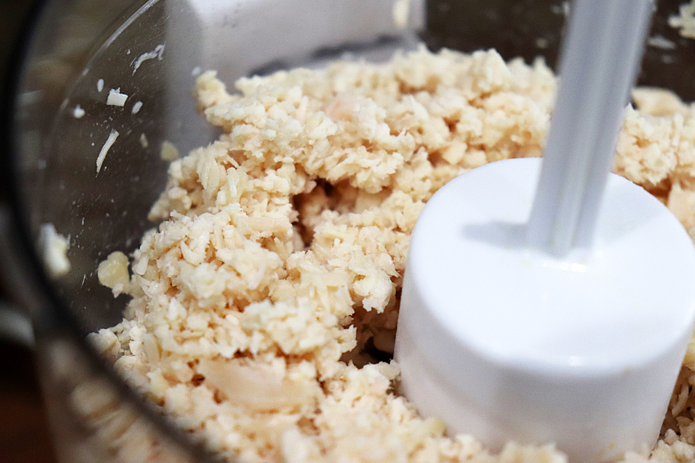 Processing the rotisserie chicken in a food processor