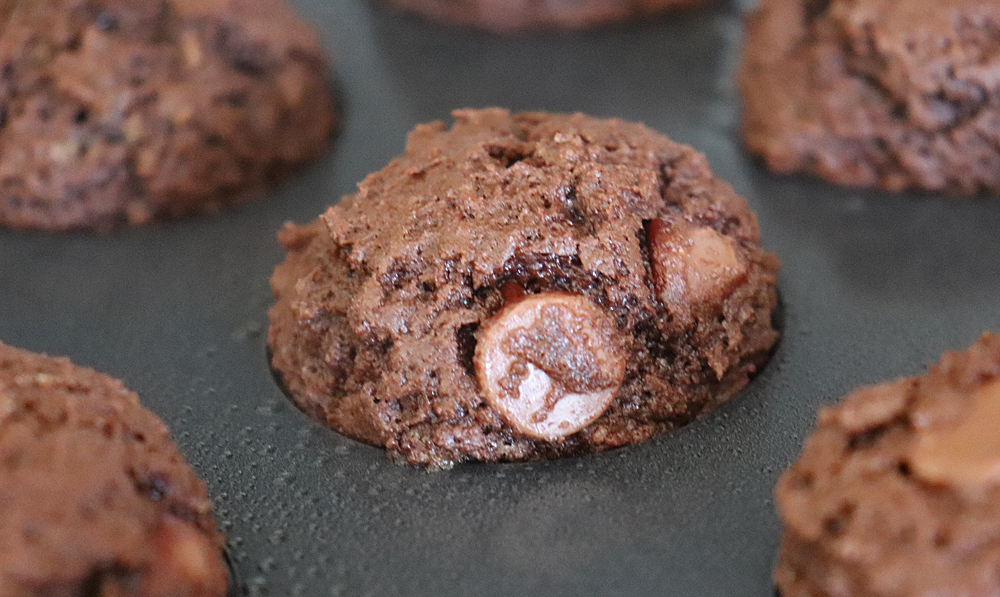 Close up of baked Glazed Chocolate Doughnut Muffins