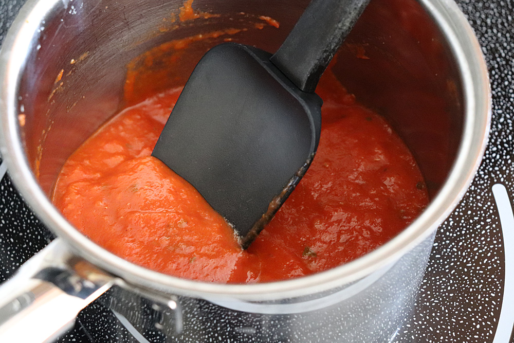 Warm the marinara